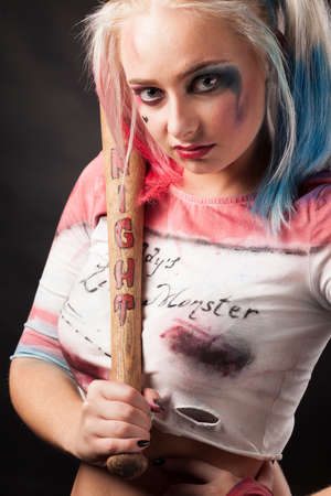 The crasy girl with candy on dark backgroundの写真素材
