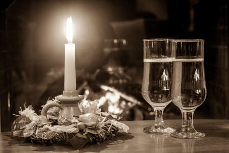 Beautiful table setting with Christmas decor in living roomの写真素材