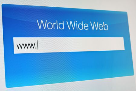 Typing internet address on LCD monitorの写真素材