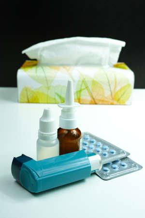 Relief asthma, allergy, flu, fever concept, seasonal allergy, medication and paper tissuesの写真素材