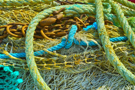 Fisherman's nets and old iron chain, background