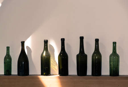 Old dark green Normandy cider and calvados bottlesの写真素材