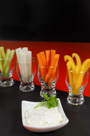 Healthy snacks - colofrul vegetable sticks and yogurt dip