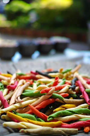 Traditional colorful Italian dried homemade pasta fusilli with eight colors from Salerno.の写真素材