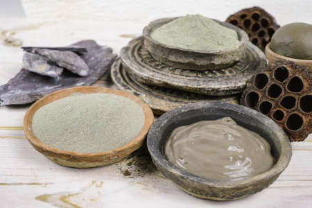 Ancient minerals - green and blue clay powder and mud mask for spa, beauty concept