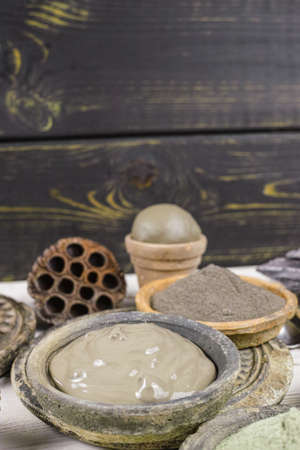 Ancient minerals - black, green, blue clay powder and mud mask for spa, beauty conceptの写真素材