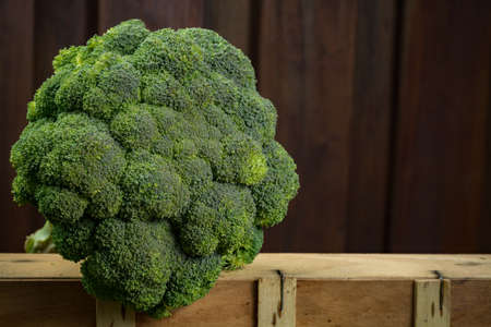 Green Fresh organic Romanesque Cauliflower, on wooden backgroundの写真素材