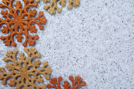 Christmas colorful snowflakes on shiny mirrored Christmas, New Year background