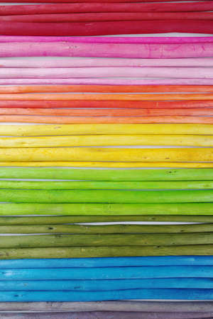 Decorative colorful wooden sticks on white background