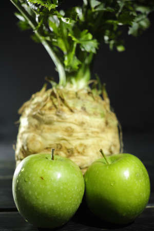 Celery root - celeriac and green apples, fresh healthy vegetables for saladの写真素材