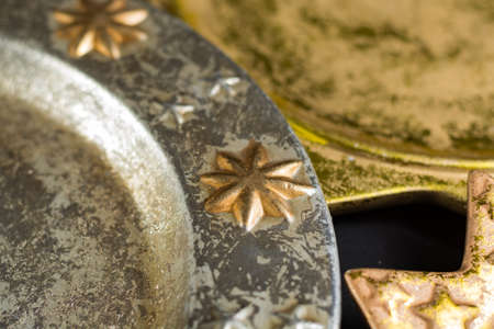 Vintage golden and silver color christmas plates, decoration and backgroundの写真素材