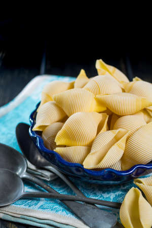 Big Italian pasta shells for stuffing, uncookedの写真素材