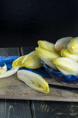 Fresh and healthy Chicory (witloof) Salad on a plate. Dietary menu.の写真素材
