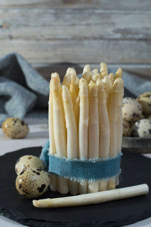 Spring season, diet meal - fresh white asparagus and quail eggsの写真素材
