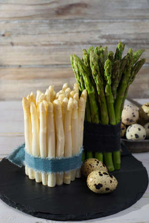 Spring season, diet meal - fresh white and green asparagus and quail eggsの写真素材
