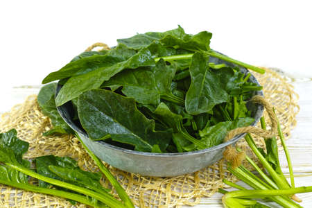 Fresh green Spinach leaves - diet and health concept, weight loss