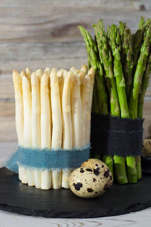 Spring season, diet meal - fresh white and green asparagus and quail eggsの写真素材