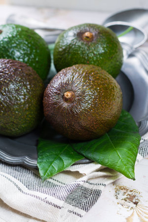 Green fresh avocado from organic avocado plantation - healthy foodの写真素材