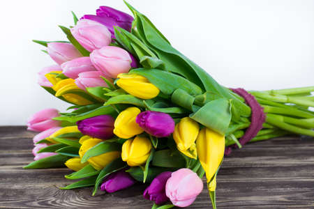 Bouquet of beautiful multicolor spring tulips on white backgroundの写真素材