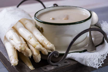 Spring season - white  asparagus cream- soup, ready to eatの写真素材