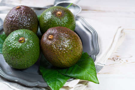 Green fresh avocado from organic avocado plantation - healthy foodの写真素材