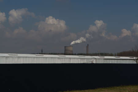 Coal Fossil Fuel Power Plant Smokestacks Emit Carbon Dioxide Pollution and greenhouseの写真素材