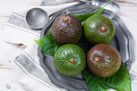 Green fresh avocado from organic avocado plantation - healthy foodの写真素材