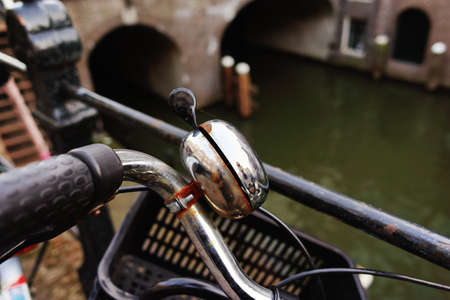 The bicycle stands near the city canal in Utrecht, cityscape, the Netherlandsの写真素材