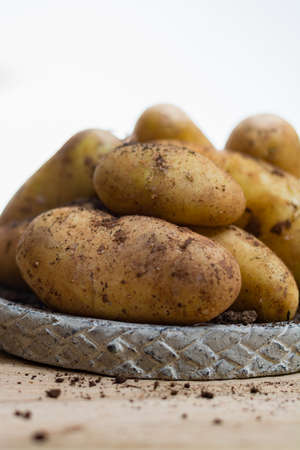 New harvest - young raw potatoes uncooked close-upの写真素材