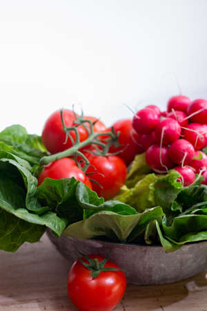 Fresh ingredients for healthy salad  red radish and green lettuceの写真素材