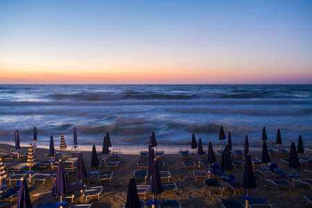 Panoramic view of the sea and sky  water and air, sunset.  Cefalu sandy beach on sunsetの写真素材