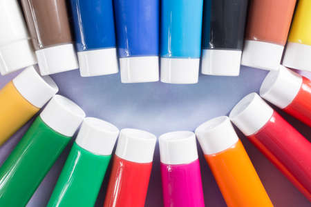 Rainbow colours smile - multicolored rainbow acrylic paints tubes set, happy colorful world conceptの写真素材