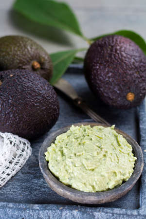 Homemade fresh avocado cream, ready to eat, tasty healthy vegetarian food, modern styleの写真素材
