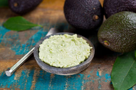Homemade fresh avocado cream, ready to eat, tasty healthy vegetarian food, modern styleの写真素材