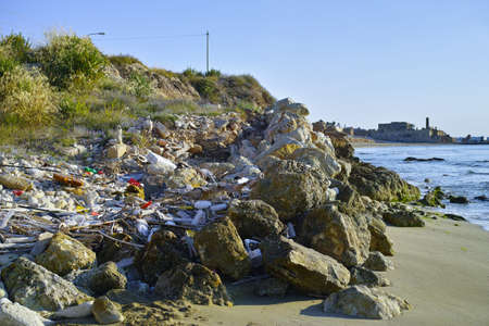 Great environmental and ecological problem, plastic waste and rubbish in world ocean water and on the beach,の写真素材
