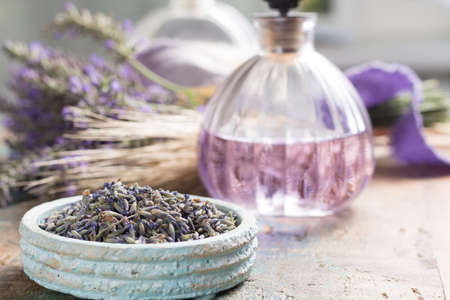 Nature cosmetics, handmade preparation of essential oils, parfums, creams, soaps from fresh and dried lavender flowers, French artisanal boutique home styleの写真素材