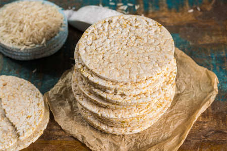 Healthy puffed rice cakes crackers stacked with sea salt close upの写真素材