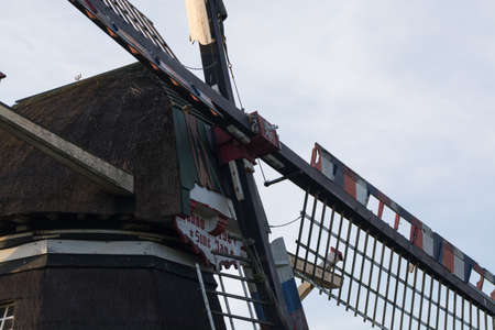 Dutch windmill, small village in North Brabant, mill on sunset in summerの写真素材