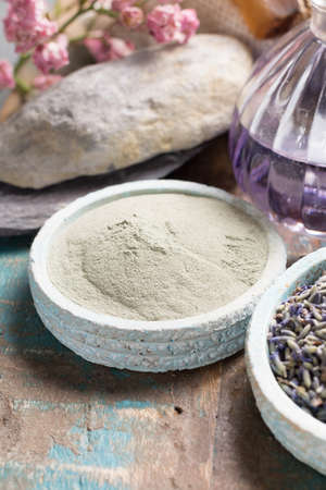 Nature cosmetics, handmade preparation with essential oils and ancient minerals of  parfums, skincare, creams, soaps from fresh and dried lavender flowers, roses, wheat, almond nuts, green clay powder in French artisanal boutique home styleの写真素材
