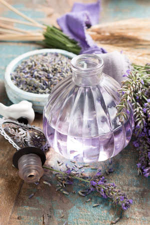 Nature cosmetics, handmade preparation of essential oils, parfums, creams, soaps from fresh and dried lavender flowers, French artisanal boutique home styleの写真素材