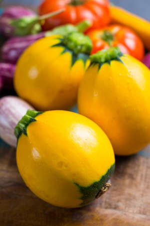 Fresh colorful organic vegetables - round courgette, small eggplants, tomatoes, diet concept, Italian and French food, healthy food.の写真素材