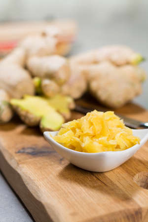 Red bowl of delicious fresh pickled sushi ginger, ready to eat, asian food conceptの写真素材