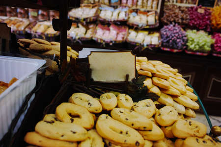 Traditional old french biscuits and cookies shop, stack with variery of cookies on sale.の写真素材
