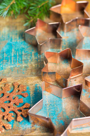 Golden metal cutting forms for christmas star cookies, biscuits, brass or copperの写真素材