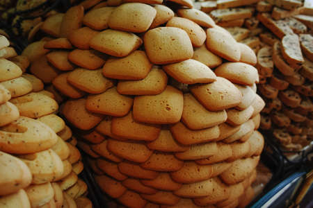 Traditional old french biscuits and cookies shop, stack with variery of cookies on sale.の写真素材