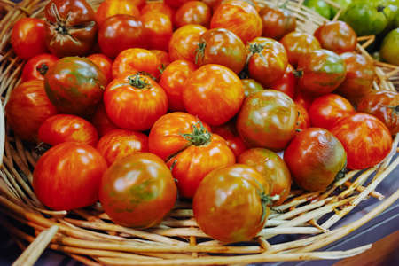 Ancient Provencal french ripe farm tomatoes on the street marketの写真素材