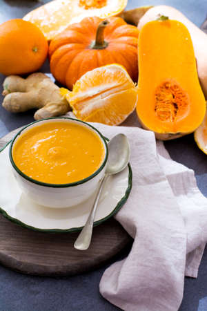 Homemade pumpkin cream soup made from fresh ripe bottle gourd pumpkinの写真素材
