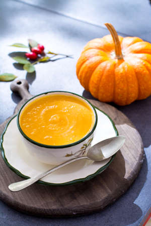 Homemade pumpkin cream soup made from fresh ripe bottle gourd pumpkinの写真素材