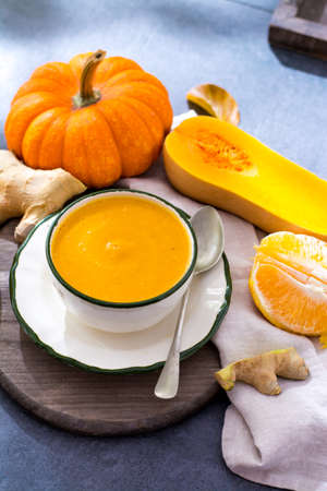 Homemade pumpkin cream soup made from fresh ripe bottle gourd pumpkinの写真素材
