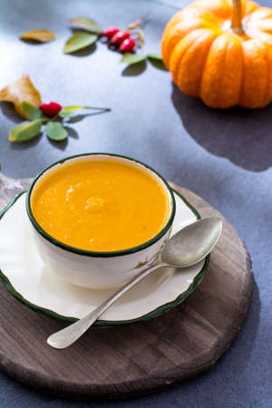 Homemade pumpkin cream soup made from fresh ripe bottle gourd pumpkinの写真素材